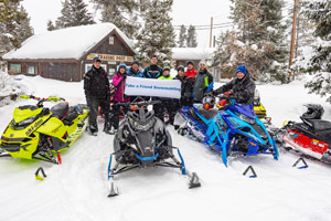 Take a Friend Snowmobiling