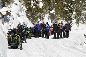 Snowmobilers in groups