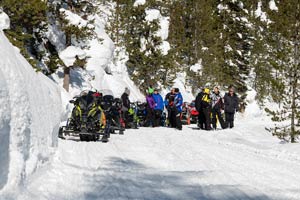 Snowmobilers in groups