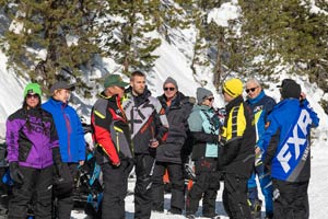 Snowmobilers in groups