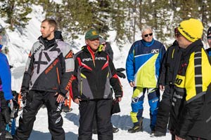 Snowmobilers in groups