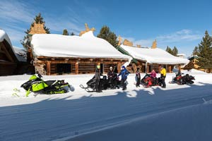 Snowmobilers in groups