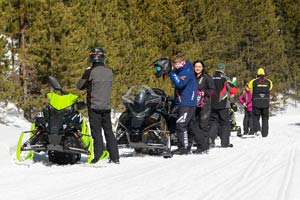 Snowmobilers in groups