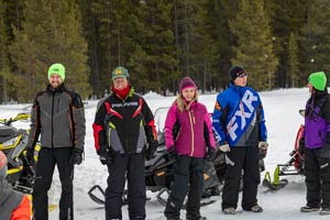 Snowmobilers in groups