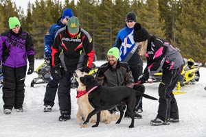 Snowmobilers in groups