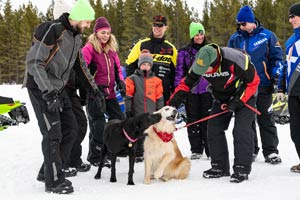 Snowmobilers in groups