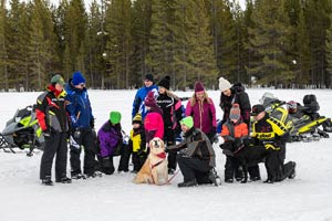 Snowmobilers in groups