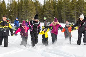 Snowmobilers in groups