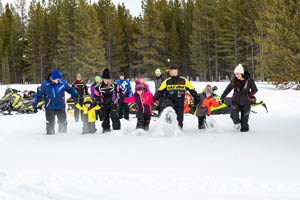 Snowmobilers in groups