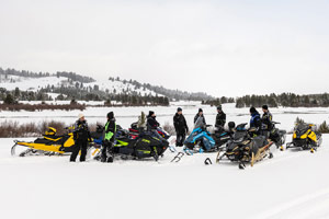 Photo of groups of snowmobilers