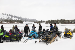 Photo of groups of snowmobilers