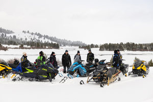 Photo of groups of snowmobilers