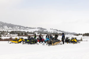 Photo of groups of snowmobilers