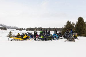 Photo of groups of snowmobilers