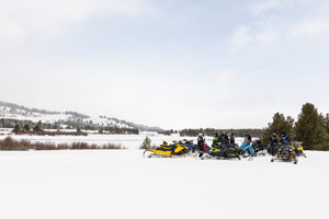 Photo of groups of snowmobilers