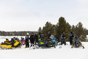 Photo of groups of snowmobilers