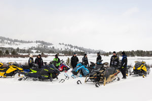 Photo of groups of snowmobilers