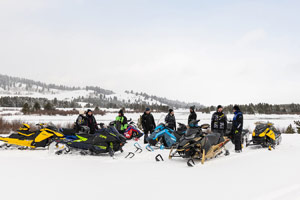 Photo of groups of snowmobilers