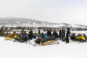 Photo of groups of snowmobilers