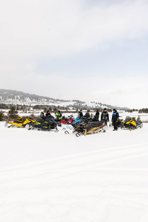 Photo of groups of snowmobilers