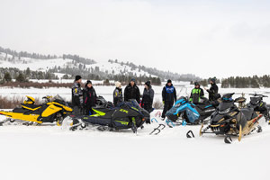 Photo of groups of snowmobilers