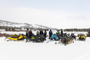 Photo of groups of snowmobilers