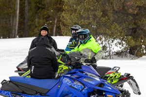 Photo of groups of snowmobilers