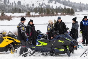 Photo of groups of snowmobilers