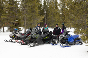 Photo of groups of snowmobilers