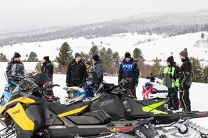 Photo of groups of snowmobilers