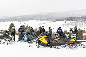 Photo of groups of snowmobilers