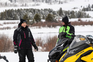 Photo of groups of snowmobilers