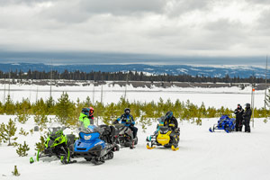 Photo of groups of snowmobilers