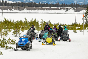 Photo of groups of snowmobilers