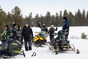 Photo of groups of snowmobilers