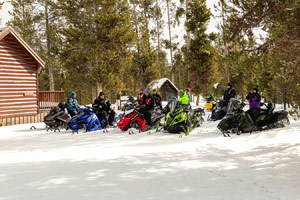 Photo of groups of snowmobilers