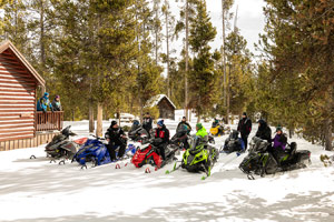 Photo of groups of snowmobilers