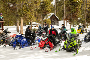 Photo of groups of snowmobilers