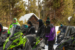 Photo of groups of snowmobilers