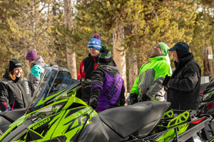 Photo of groups of snowmobilers