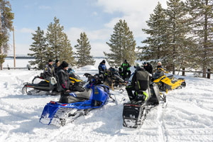 Photo of groups of snowmobilers