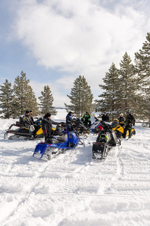 Photo of groups of snowmobilers