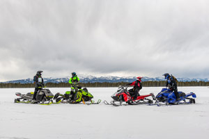 Photo of groups of snowmobilers