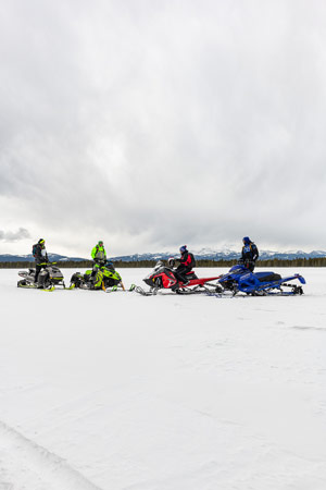 Photo of groups of snowmobilers