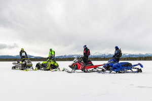 Photo of groups of snowmobilers