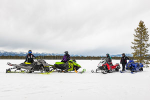 Photo of groups of snowmobilers