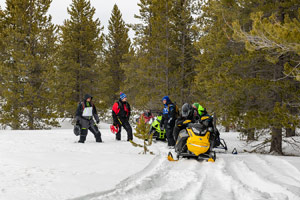 Photo of groups of snowmobilers