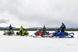 Photo of groups of snowmobilers