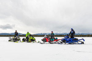 Photo of groups of snowmobilers