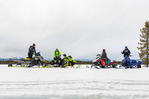 Photo of groups of snowmobilers